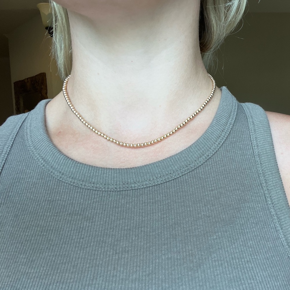 Gold Karen Lazar necklace- tag still on it/dust bag. Adjustable size. $155 orig